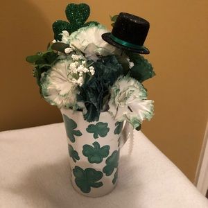 Ceramic shamrock mug with silk floral decoration.
